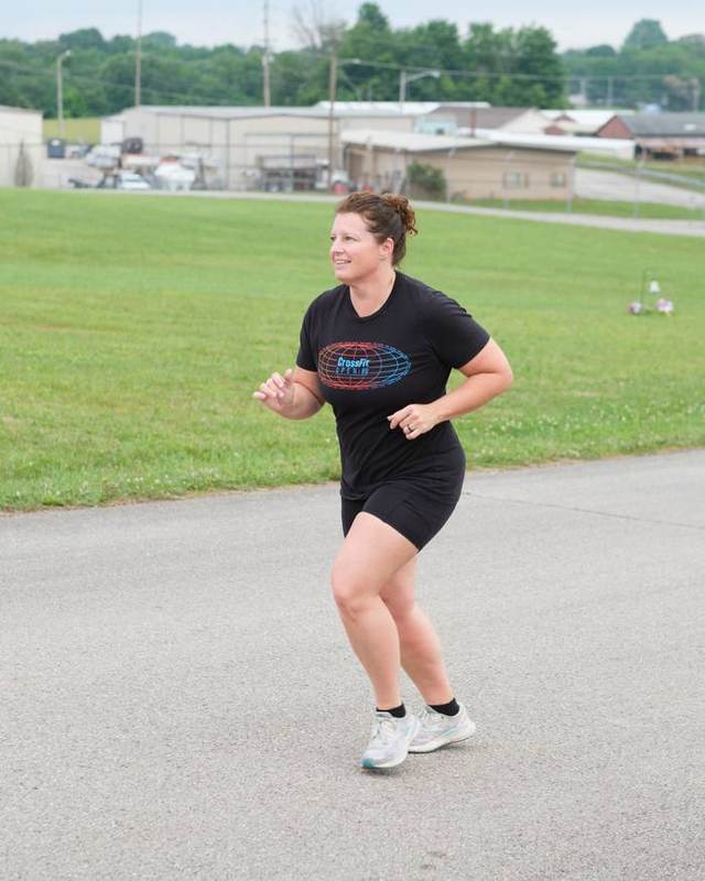 An RNF member running, mid-stride, in Glasgow, KY