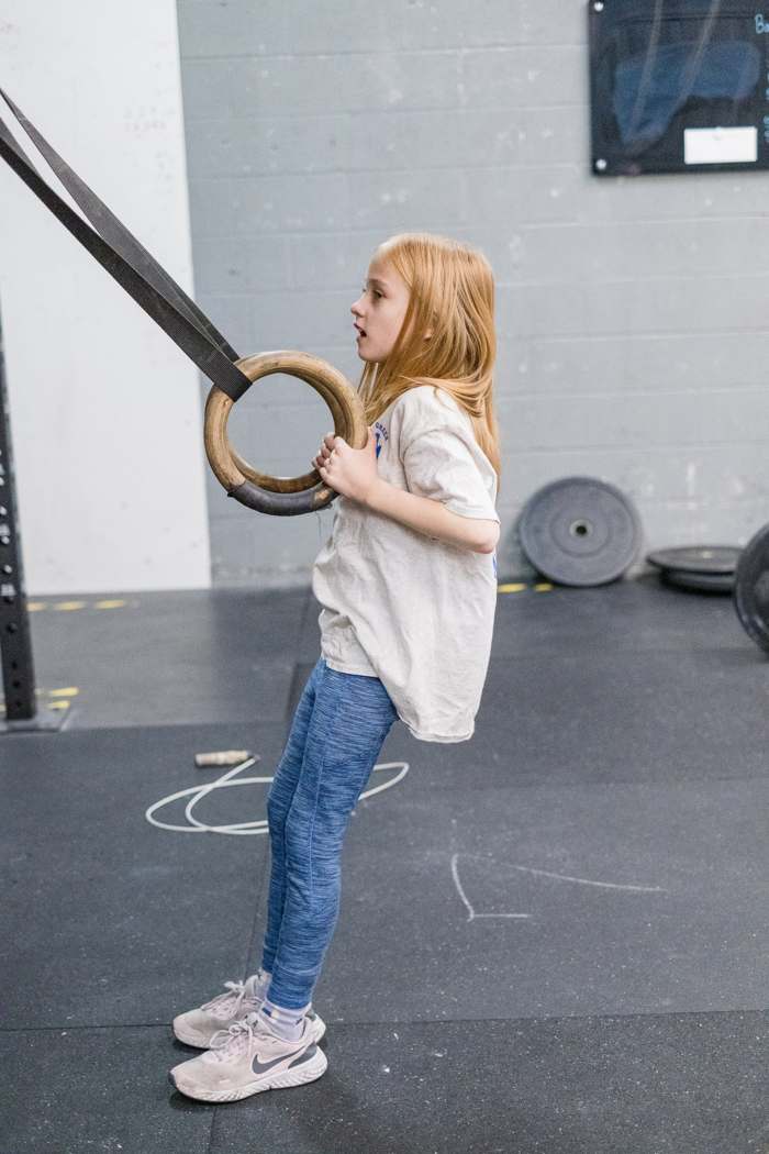 RNF CrossFit Kids member on the rings