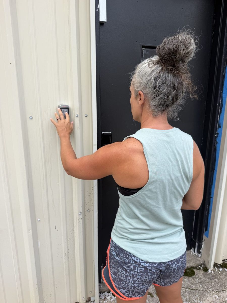 An RNF member using the keypad to enter the 24/7 area